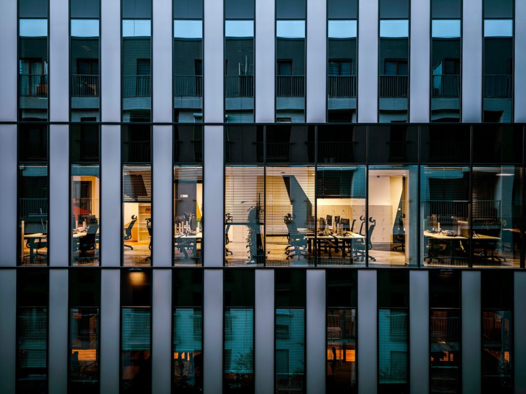 Office floor behind glass wall taken seen from outside