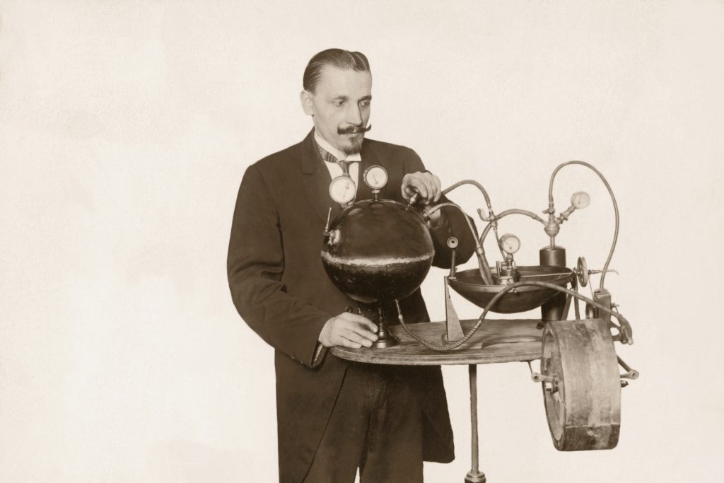 Vintage photograph of man with perpetual motion machine